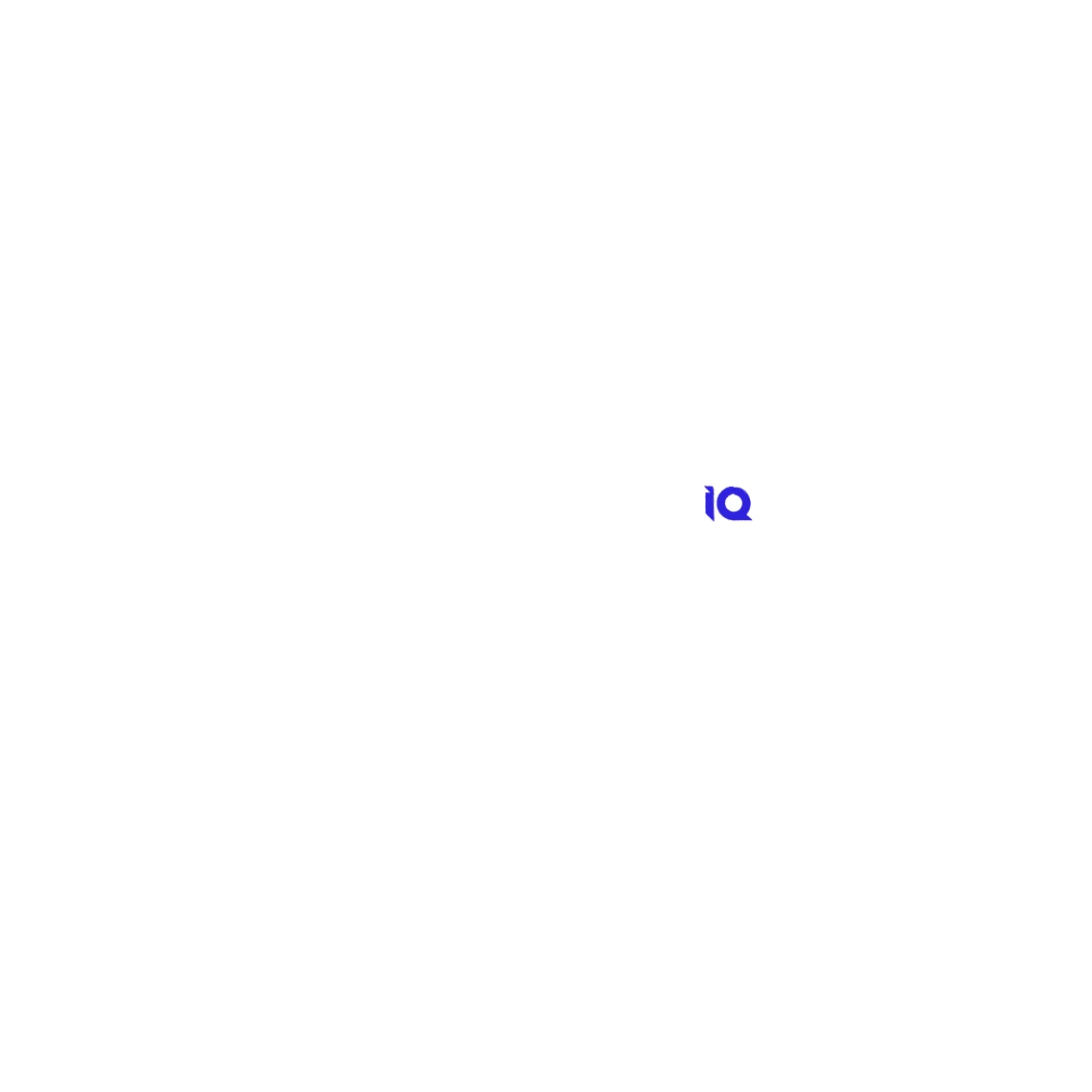 Lounge area of a modern office with brick walls and stylish furniture